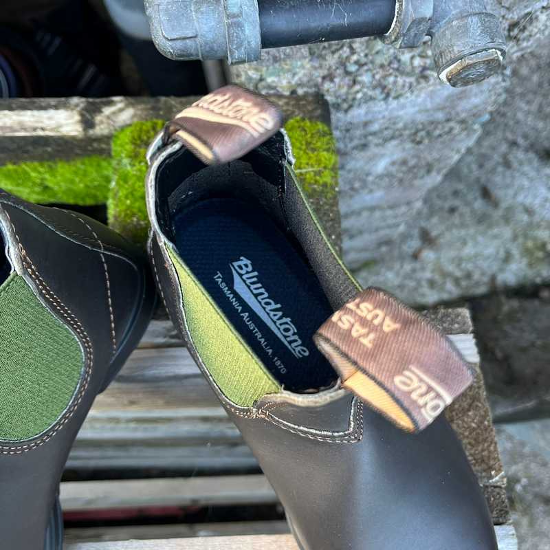 Pair of green and brown Blunnies with Blundstone branding 