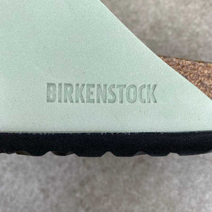 BIRKENSTOCK Arizona Matcha Nubuck Leather Soft Footbed logo